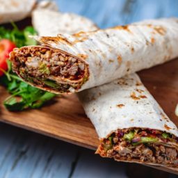 side-view-chicken-doner-with-greens-cucumber-tom
