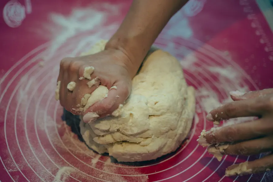 Bread dough being kneaded