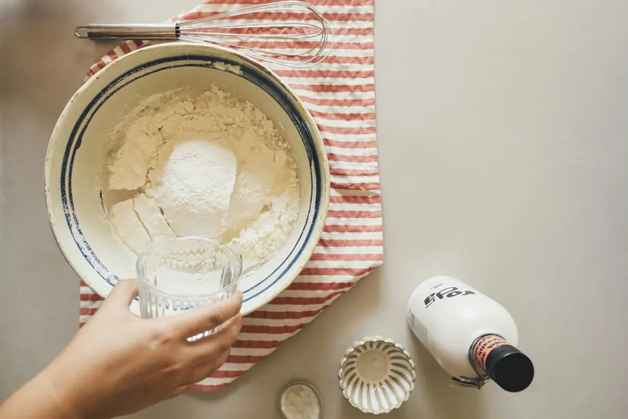 Bread dough rising in a bowl