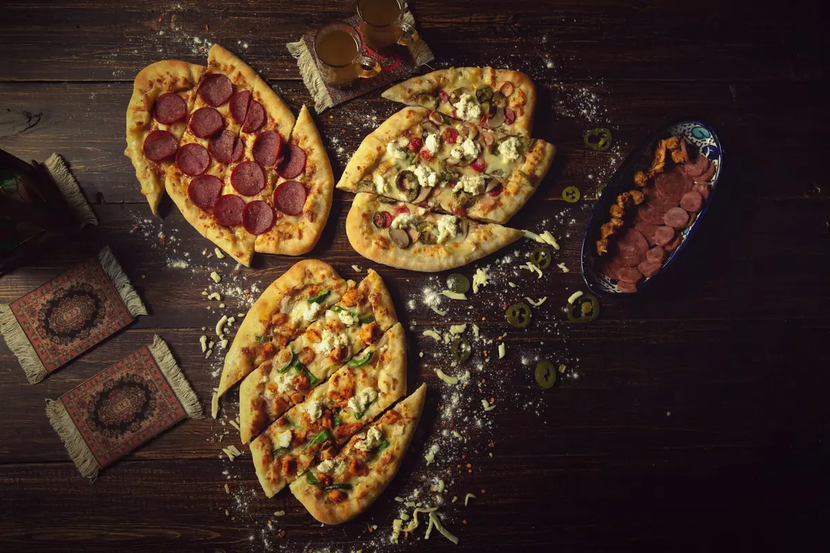 An assortment of flatbreads arranged on a table