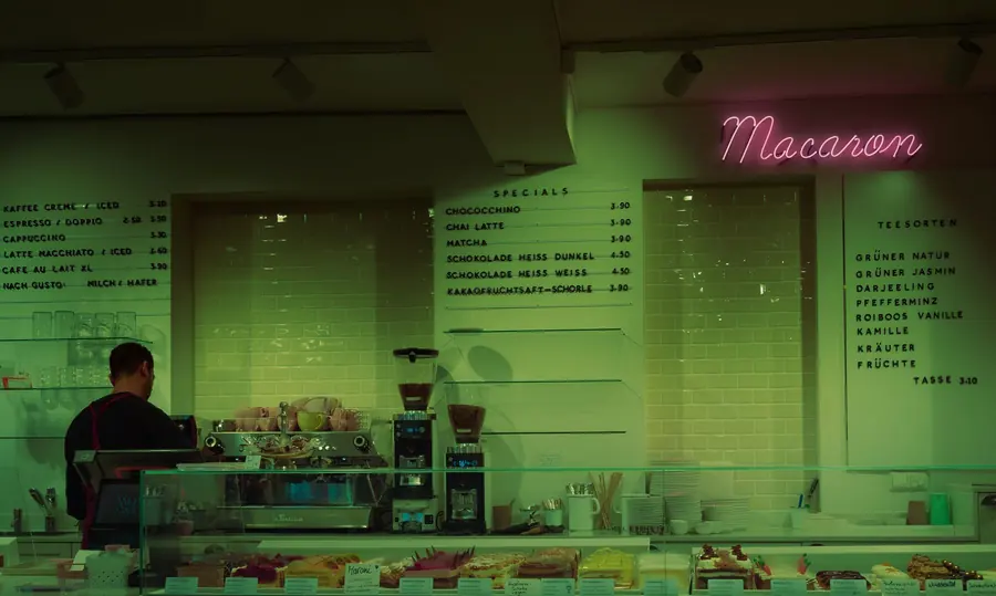 A menu board above a cafe counter