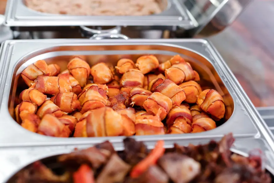 Foil catering trays stacked and ready for delivery