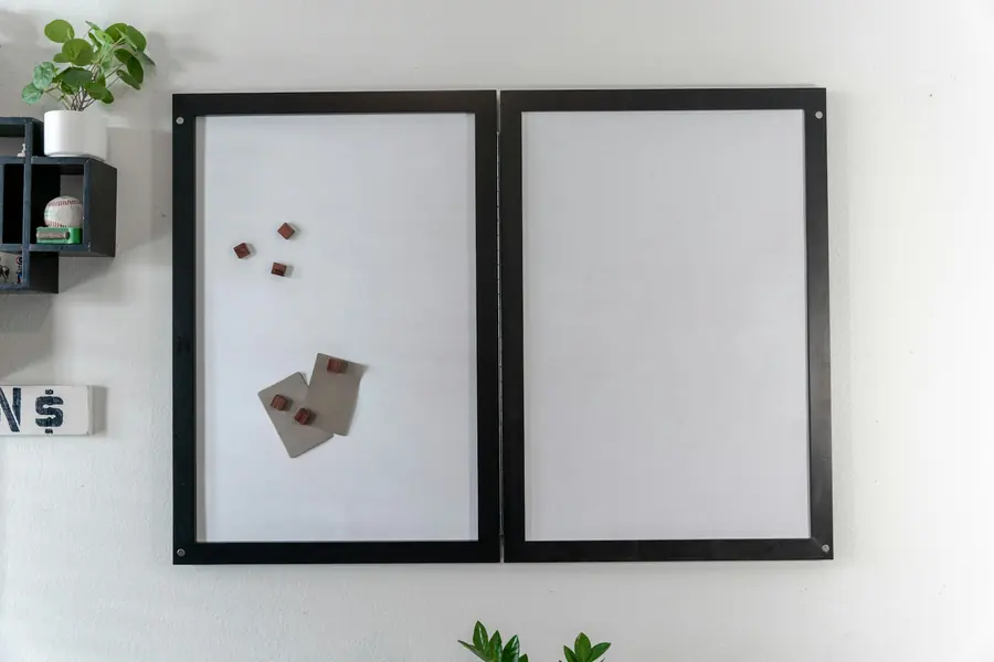 A framed certificate displayed on a wall