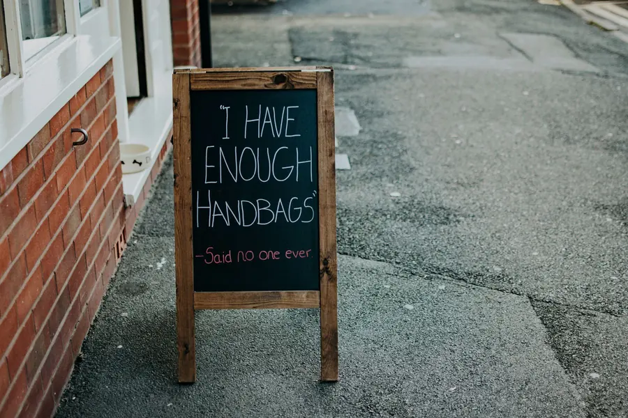 A chalkboard sign outside a cafe