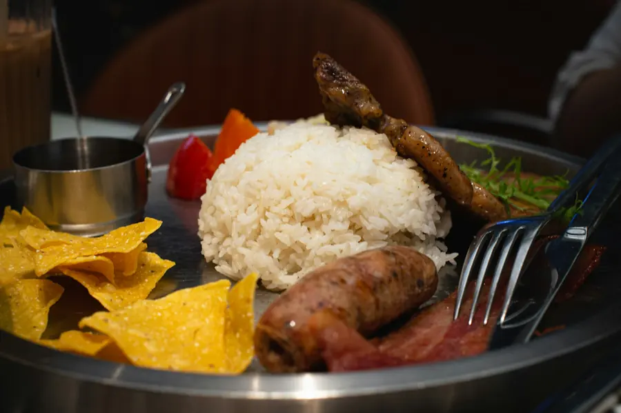 A platter with two meats and rice