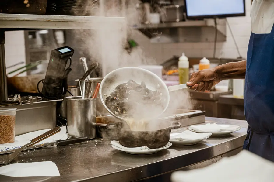 A commercial deep fryer in a restaurant kitchen