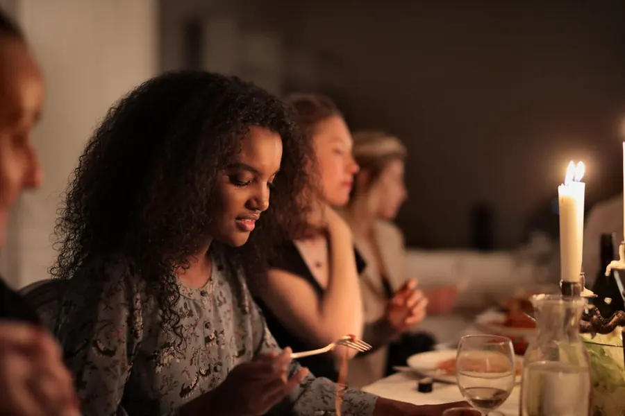 A group of people eating together