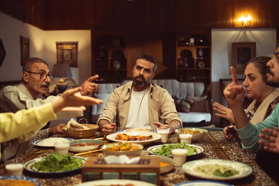 A family sharing dinner around a table