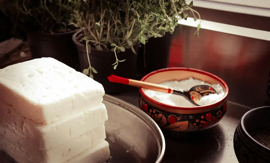 A block of feta, partly crumbled