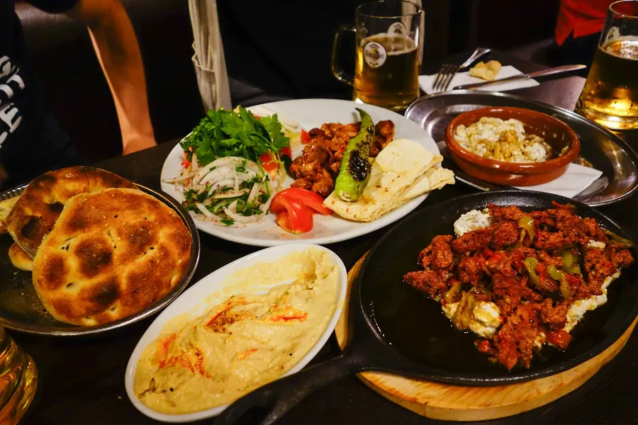 Flatbread served with an assortment of dips