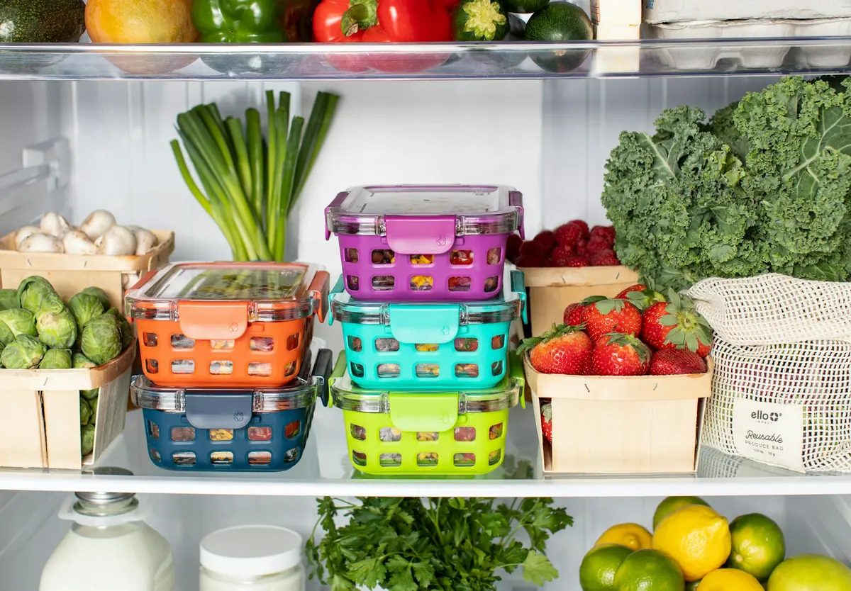 Food storage containers stacked in a refrigerator