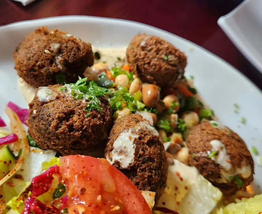 Falafel served with fresh salad and tahini