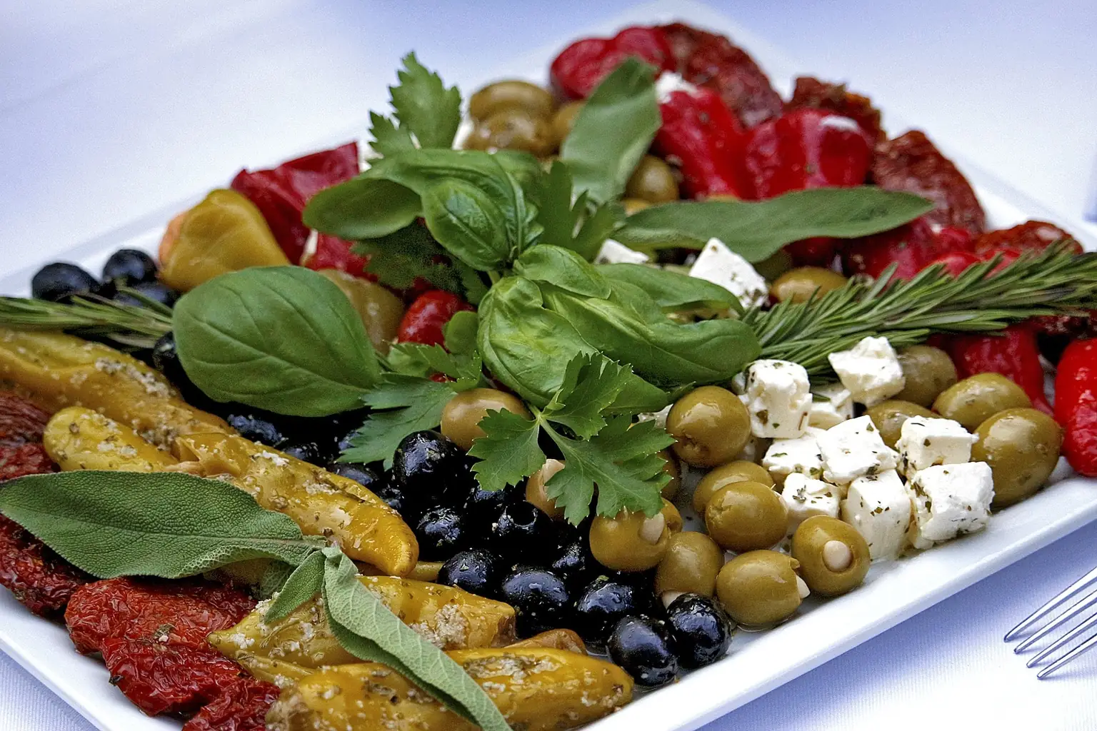 Mediterranean catering buffet with rice, grilled meats and salads