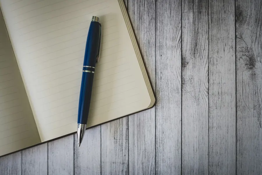 Working through a guest list on paper
