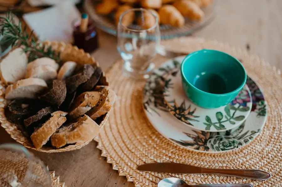 A dining table at home set with food