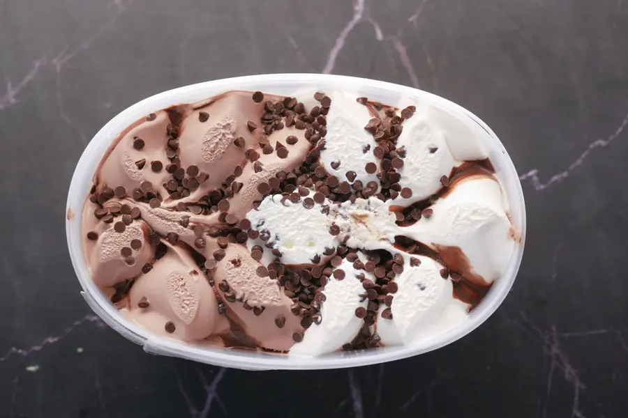 Scoops of ice cream in a tub