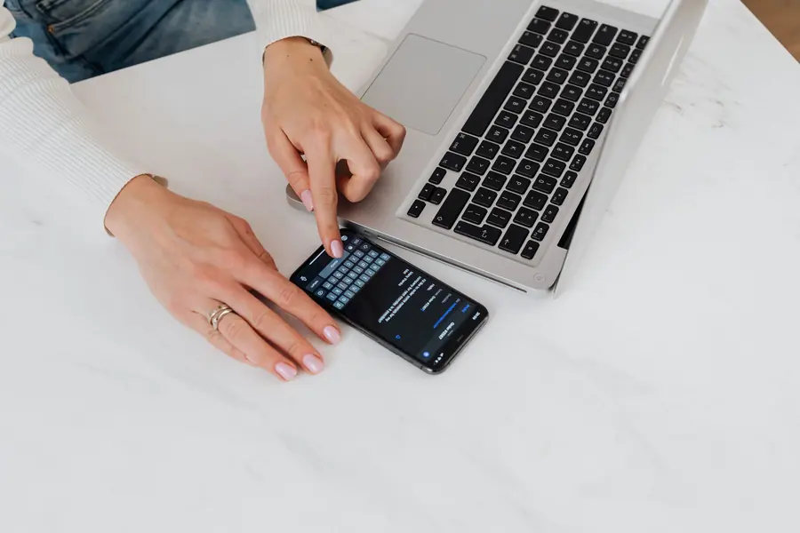 A laptop and phone used to order online