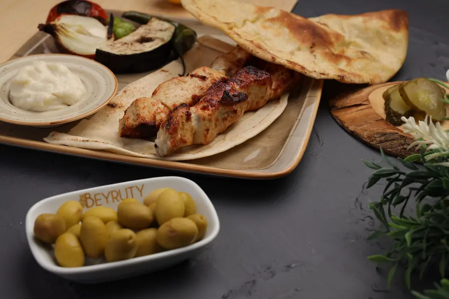 Grilled chicken served with garlic sauce