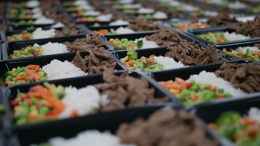 Prepared meal boxes stacked ready for distribution