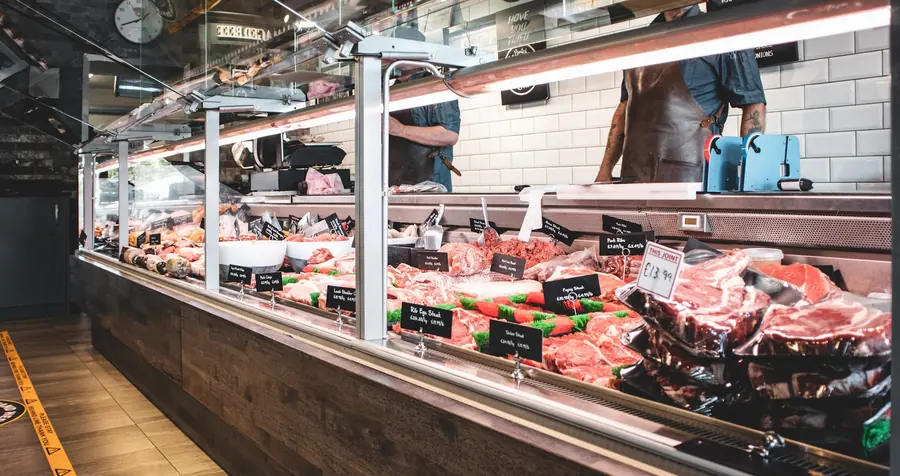 A refrigerated meat display case