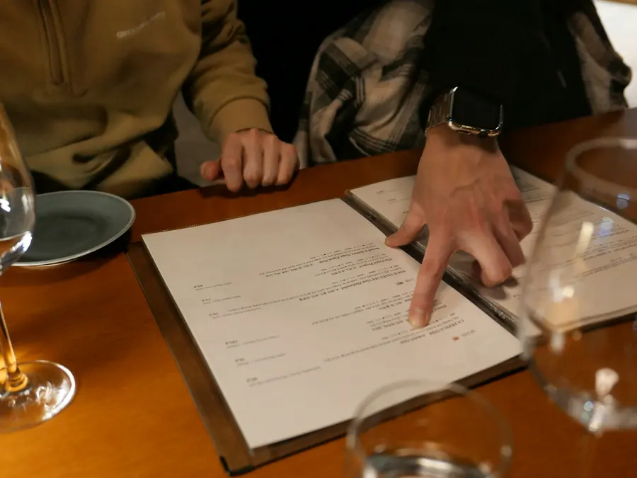 A diner reading a restaurant menu