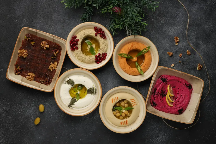 An assortment of small plates and dips
