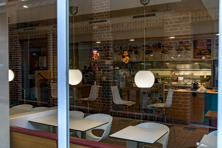 An open kitchen visible from the dining area