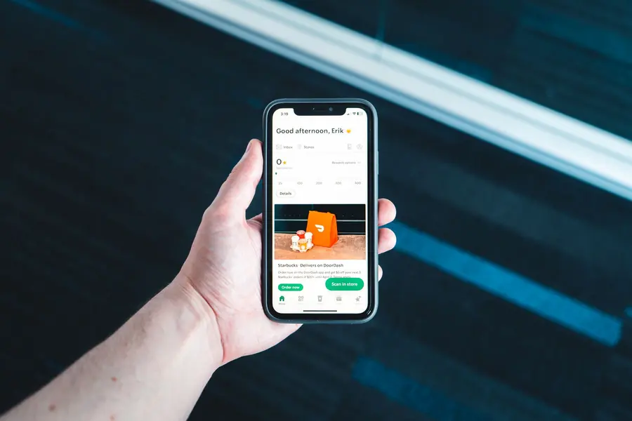 A phone showing a food delivery app