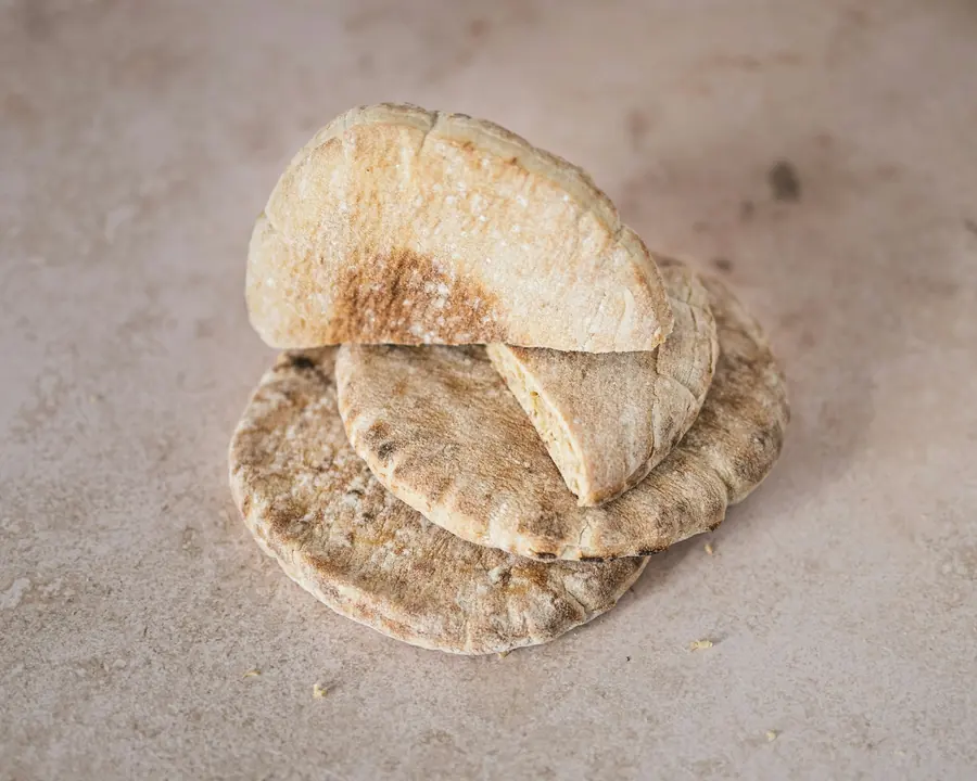 A stack of soft round pita bread
