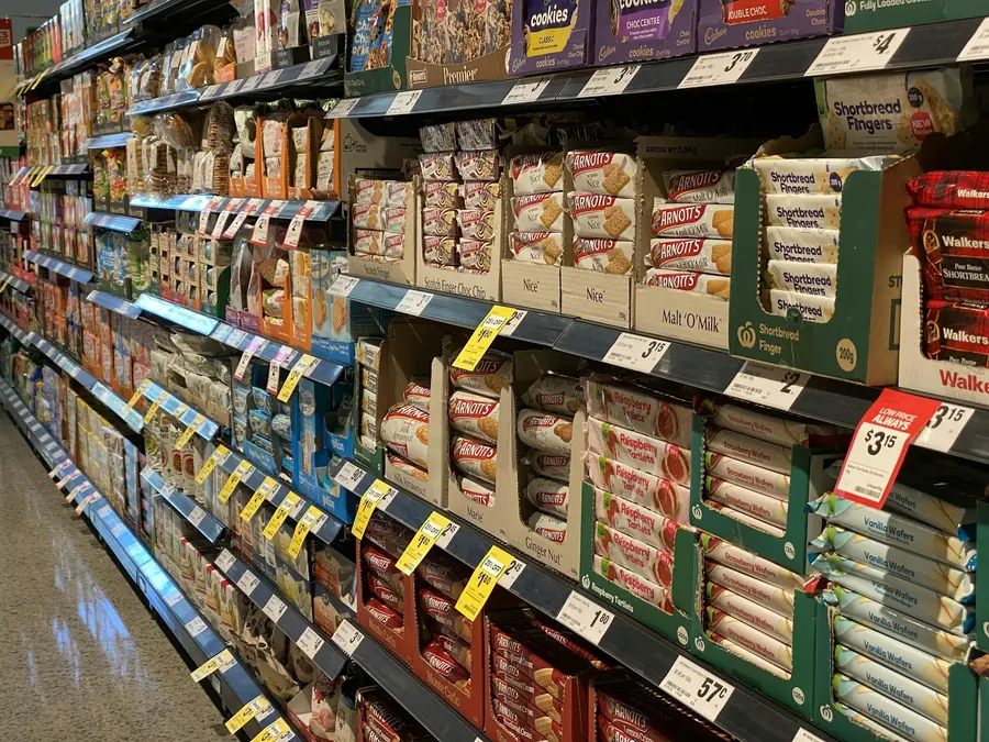 Price labels along a supermarket shelf