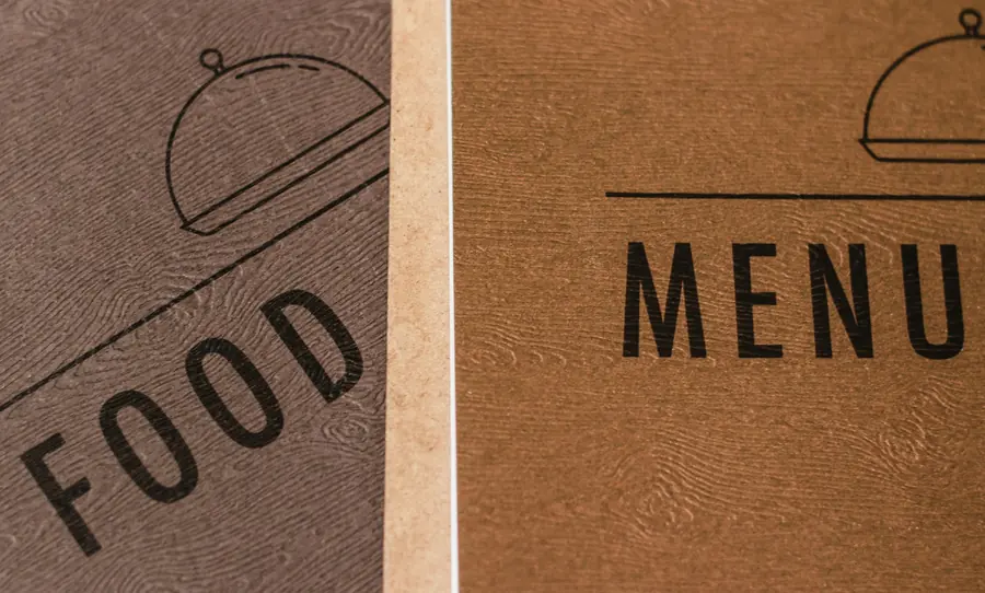 A printed menu on a restaurant table