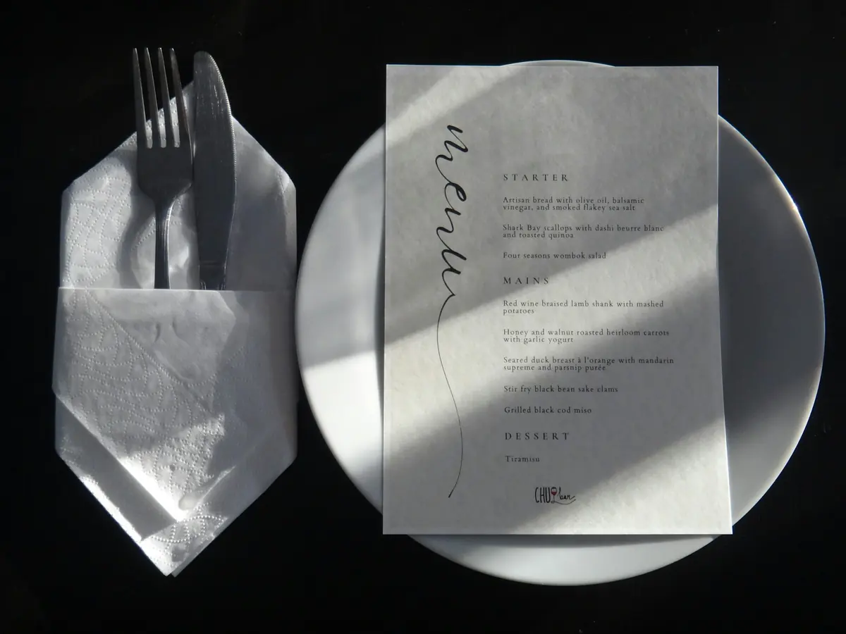 A printed menu on a table