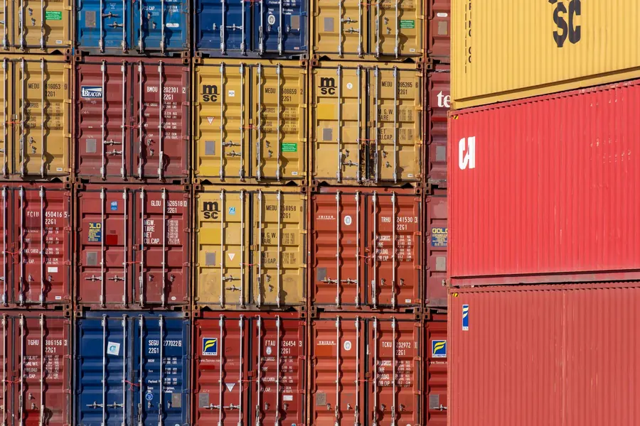 Shipping containers stacked at a port