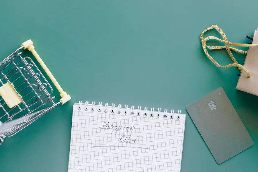 A shopping list and pen