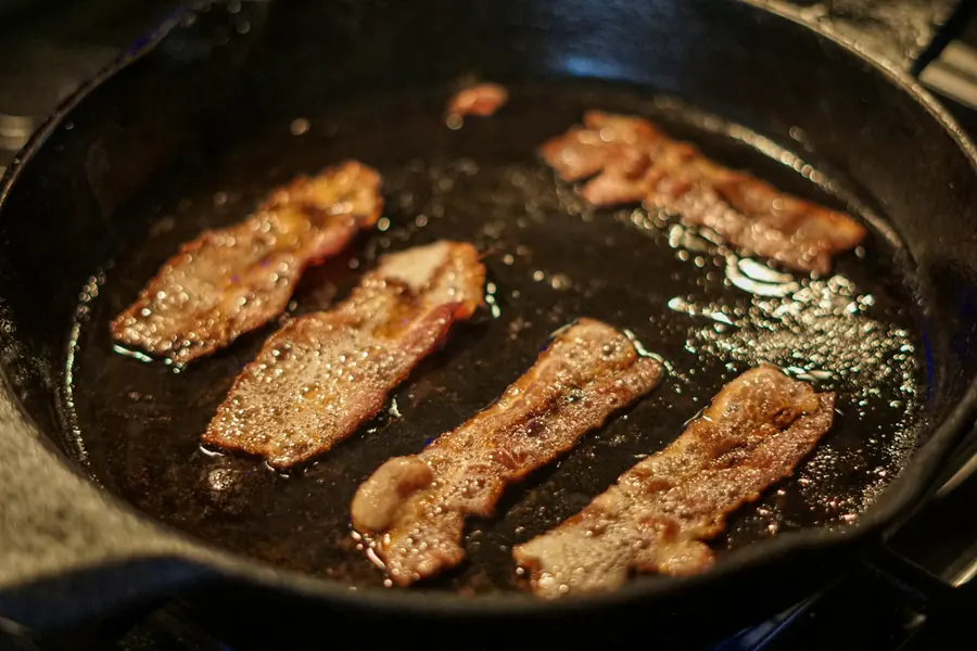 Food warming in a skillet on the stove