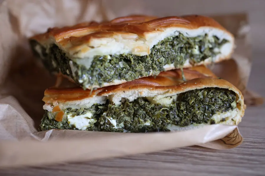 Layered phyllo pastry filled with spinach and cheese