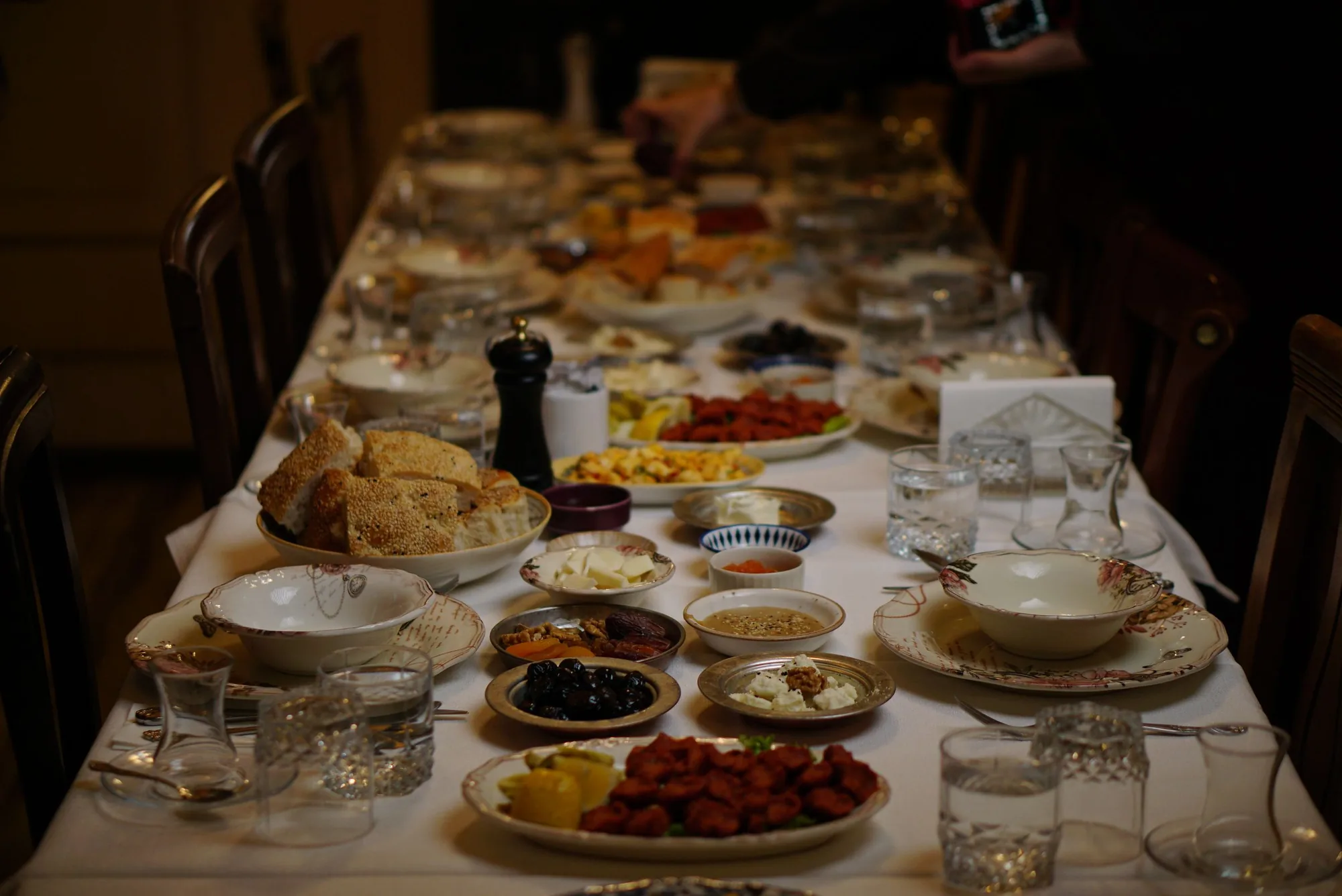 A long table set with traditional Mediterranean dishes