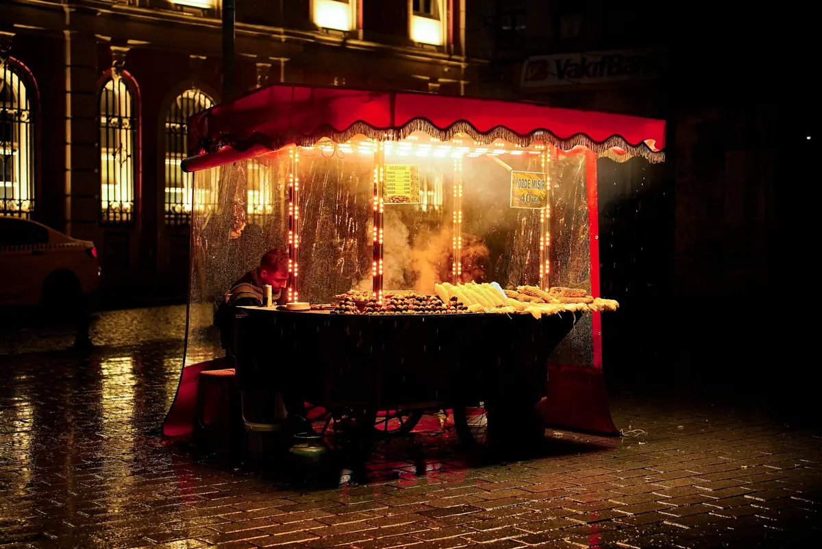 A street food cart at night