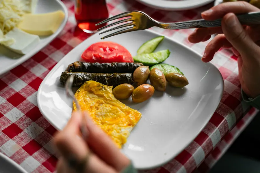 Stuffed vine leaves arranged on a plate
