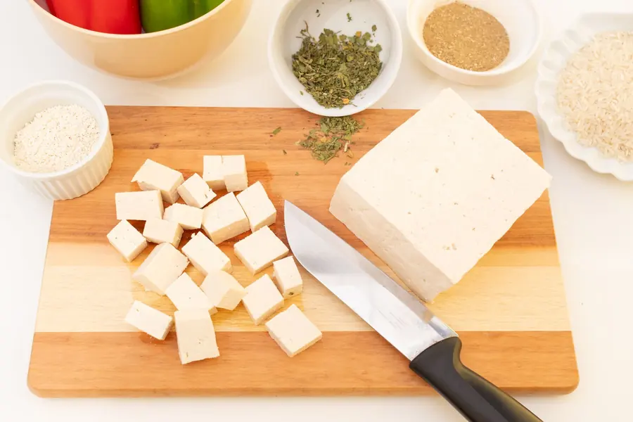Blocks of tofu on a wooden board