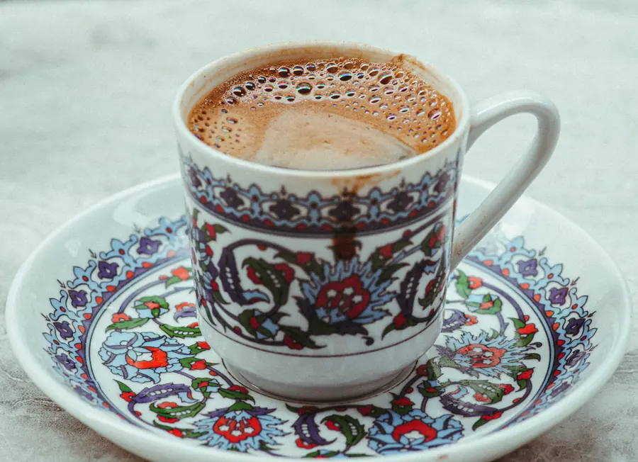 Turkish coffee served in a small cup