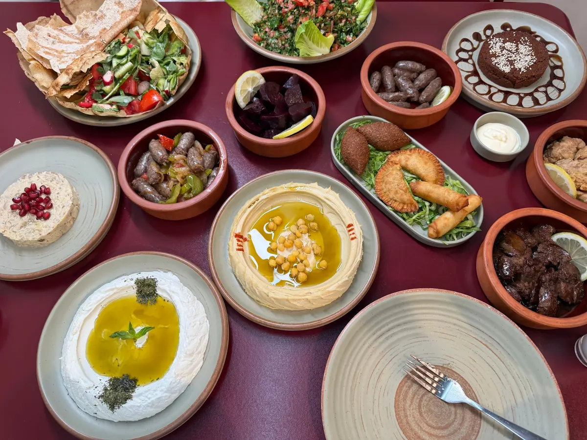 A vegetarian mezze spread of dips, salads and vegetables