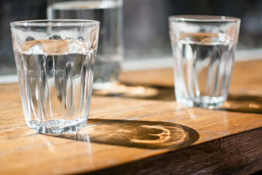 A water carafe and glasses on a table